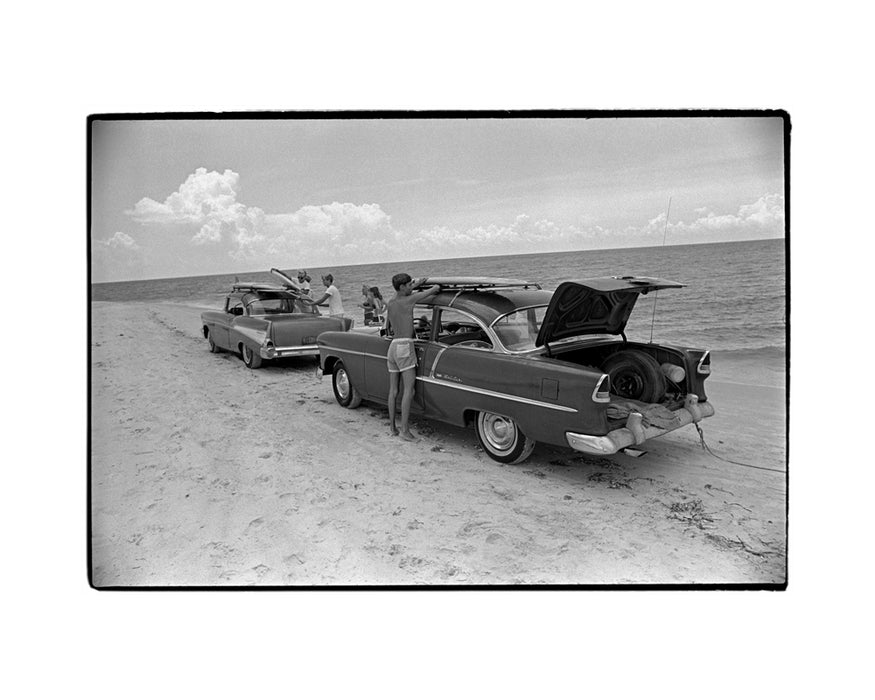 Surfer kids loading their surfboards into their cars, Florida, 1964 — Limited Edition Print