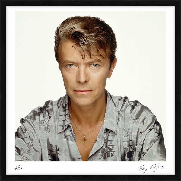 David Bowie wearing a cross, 1992 — Limited Edition Print, framed - Terry O'Neill