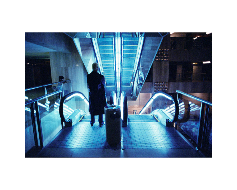 David Bowie in a Singapore mall, 1983 – Limited Edition Print by Denis O'Regan – Limited Edition Print.