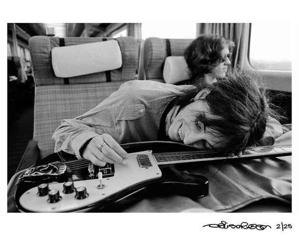 Patti Smith on a train in the UK, 1978 — Signed Limited Edition Print - Denis O'Regan