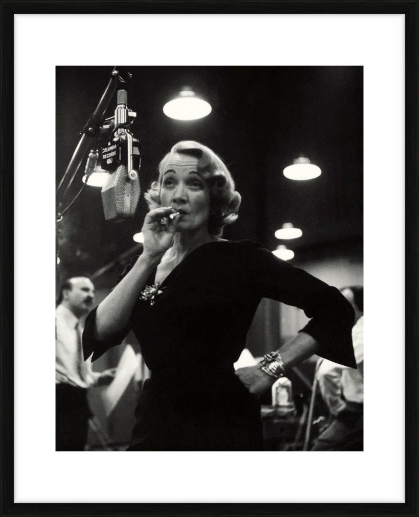 Marlene Dietrich smoking a cigarette at Columbia Records, 1952 - Limited Edition Print by Eve Arnold – Limited Edition Print.