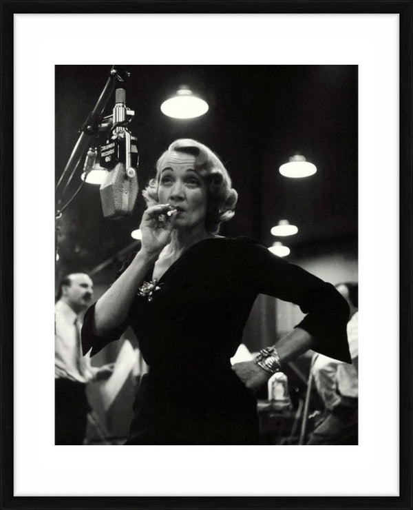 Marlene Dietrich smoking a cigarette at Columbia Records, 1952 — Limited Edition Print, framed - Eve Arnold