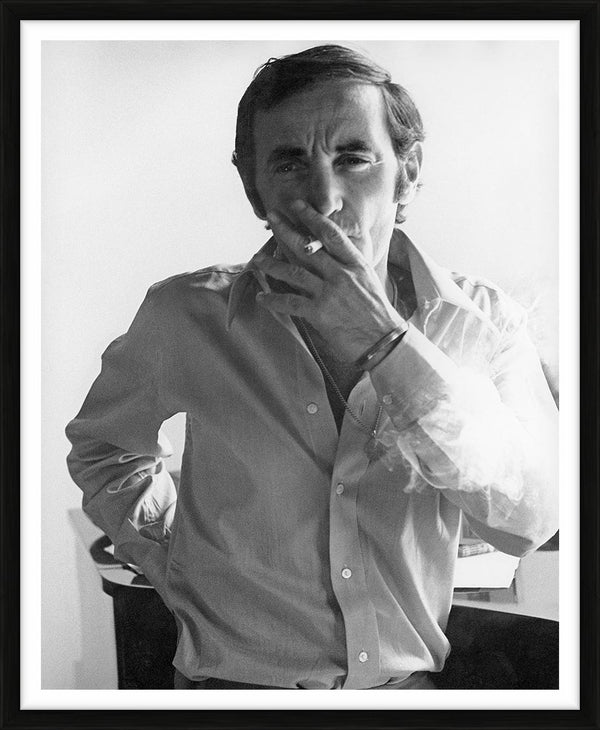 Charles Aznavour smoking a cigarette — Limited Edition Print, framed - Eva Sereny