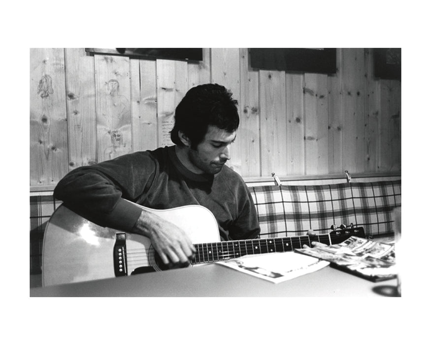 Freddie Mercury playing guitar at Music Land Studio, 1979 — Open Edition Print