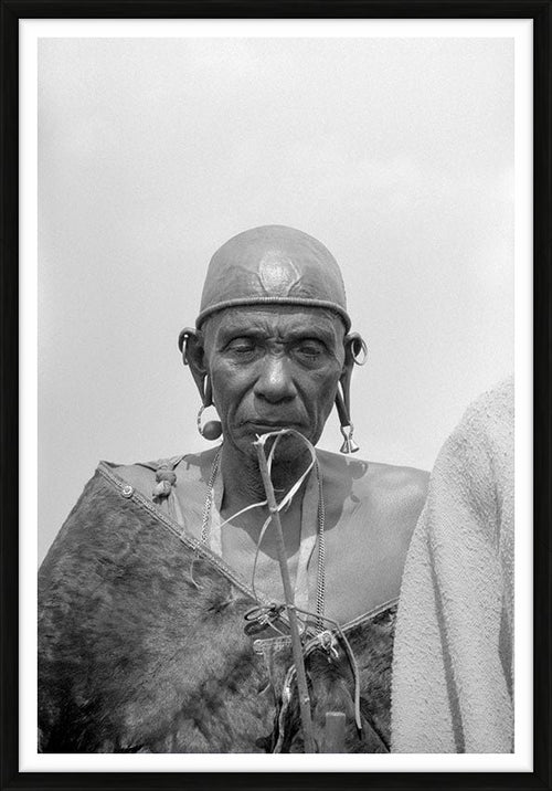 A Kenyan doctor in tribal regalia, 1979 — Limited Edition Print, framed - George Rodger