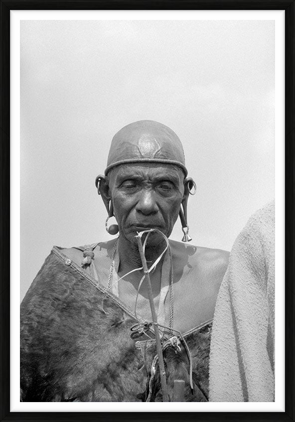 A Kenyan doctor in tribal regalia, 1979 — Limited Edition Print, framed - George Rodger