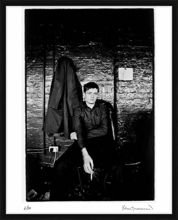 Ian Curtis in TJ Davidson's rehearsal room, 1979 — Limited Edition Print, framed - Kevin Cummins
