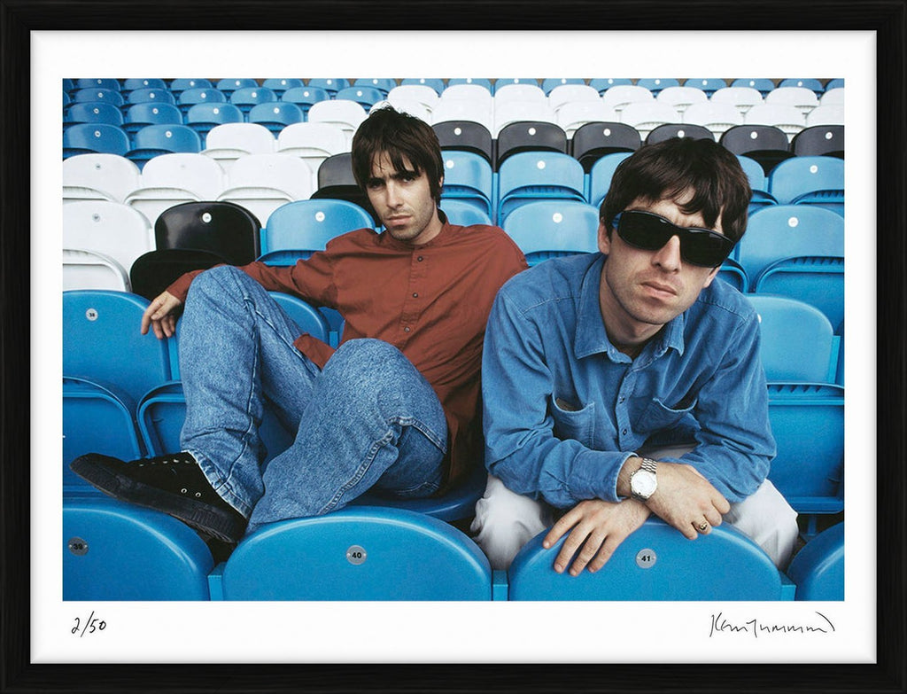 Noel Gallagher and Liam Gallagher photographed at Maine Road stadium, 1994 - Limited Edition Print by Kevin Cummins – Limited Edition Print.