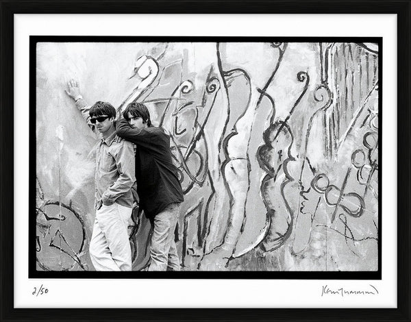 Noel Gallagher and Liam Gallagher of Oasis, photographed together, 1994 — Limited Edition Print, framed - Kevin Cummins