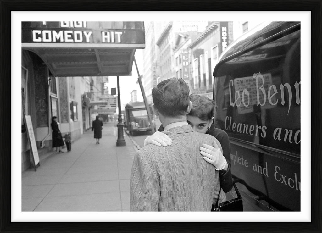 Audrey Hepburn in an embrace in front of the Fulton Theater, 1951 – Limited Edition Print by Lawrence Fried – Limited Edition Print.