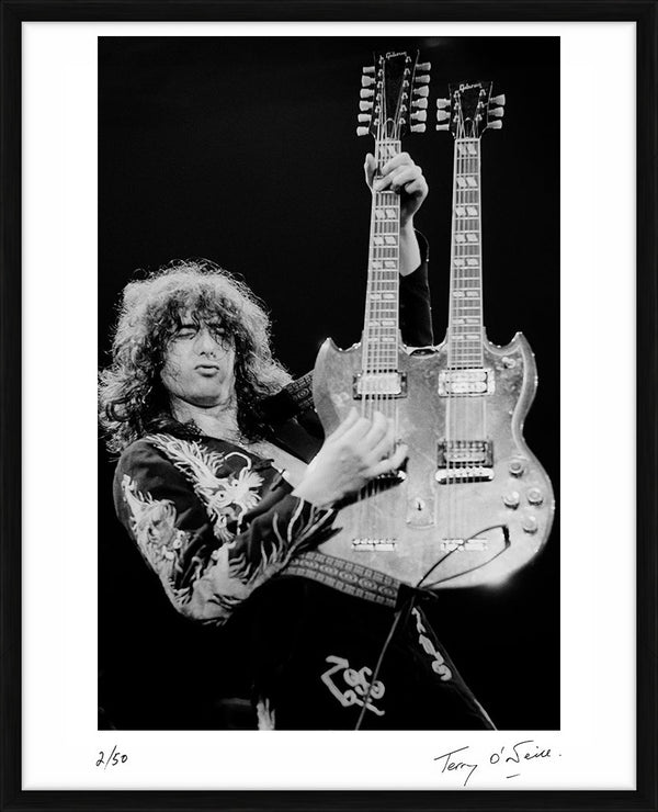 Jimmy Page playing his double neck Gibson, 1975 — Limited Edition Print, framed - Terry O'Neill