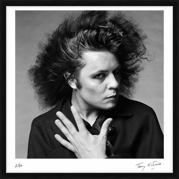 Marc Bolan poses for a photoshoot, 1975 — Limited Edition Print, framed - Terry O'Neill