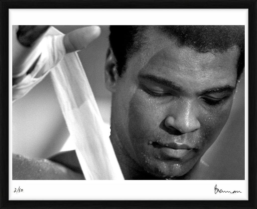 Muhammad Ali wrapping his hand, 1977 - Limited Edition Print by Michael Brennan – Limited Edition Print.