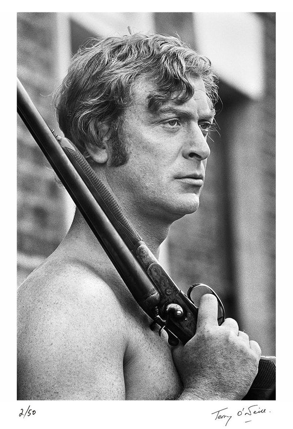 Michael Caine holding a rifle, 1970 — Signed Limited Edition Print - Terry O'Neill