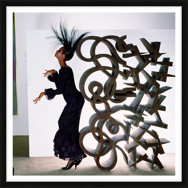 Iman posing with Lucas Samaras’ sculpture, 1982 — Limited Edition Print, framed - Norman Parkinson