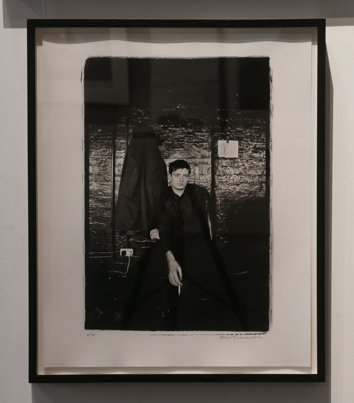 Ian Curtis in TJ Davidson's rehearsal room, 1979 by Kevin Cummins – Limited Edition Print.