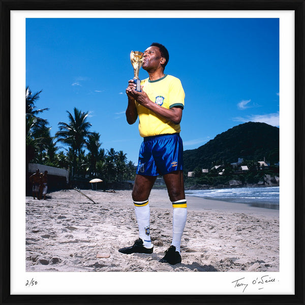 Pelé kissing the World Cup Trophy, 2013 — Limited Edition Print, framed - Terry O'Neill