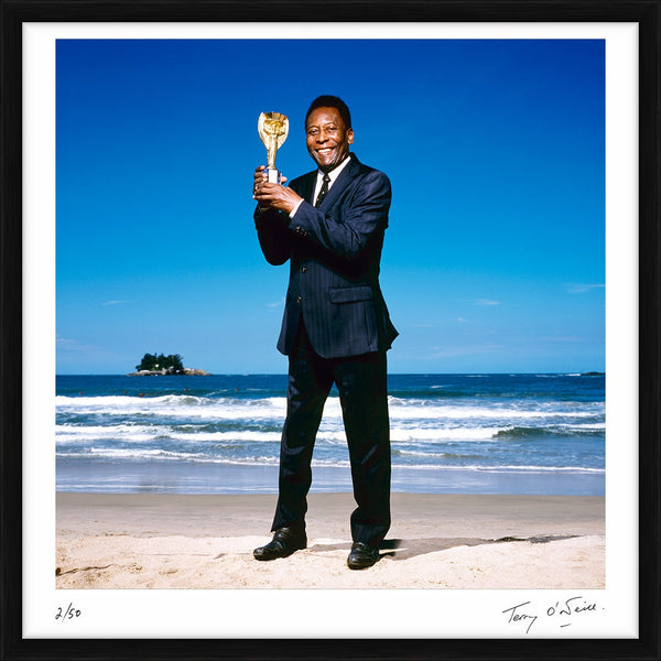 Pelé holding the World Cup Trophy, 2013 — Limited Edition Print, framed - Terry O'Neill