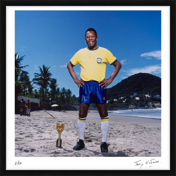 Pelé on the beach in Santos, 2013 — Limited Edition Print, framed - Terry O'Neill