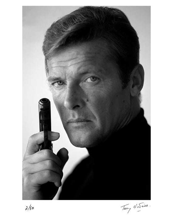 Roger Moore as James Bond, with his weapon of choice, December 1972 — Limited Edition Print