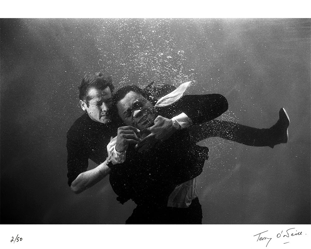 Roger Moore as James Bond underwater on the film set of 'Live and let die', 1973 by Terry O'Neill – Limited Edition Print.