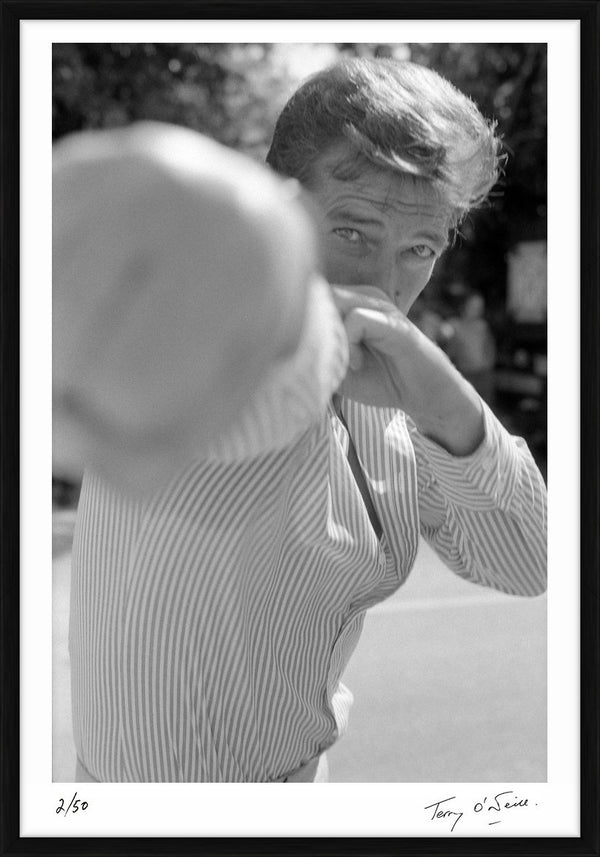 Roger Moore, 'The Punch', 1975 — Limited Edition Print, framed - Terry O'Neill