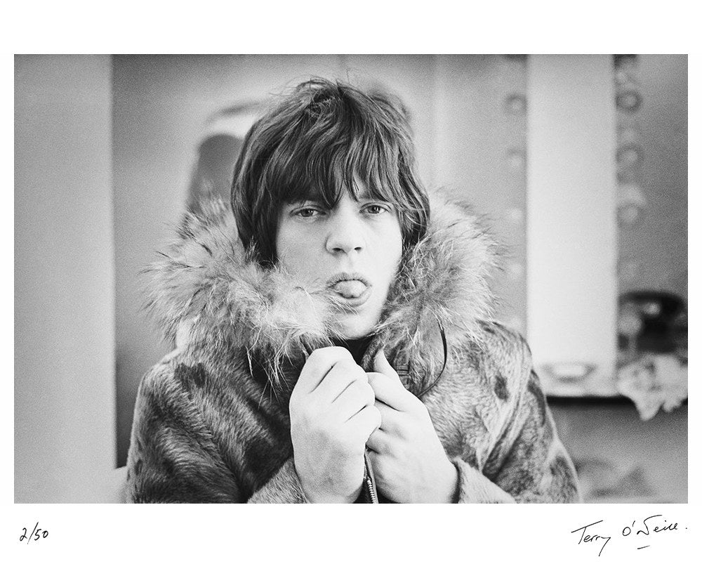Mick Jagger poking his tongue out, 1964 by Terry O'Neill – Limited Edition Print.