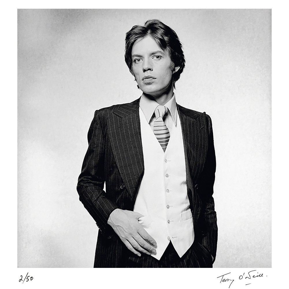 Rolling Stones singer Mick Jagger dressed in a pinstripe suit, 1976 by Terry O'Neill – Limited Edition Print.