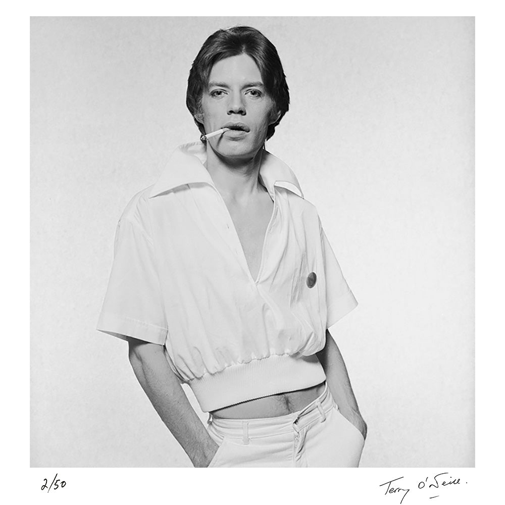 Rolling Stones singer Mick Jagger in a white short-sleeved jacket, circa 1975 by Terry O'Neill – Limited Edition Print.