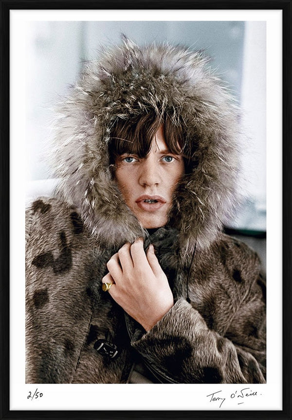 Mick Jagger in a fur parka (colourised), 1964 — Limited Edition Print, framed - Terry O'Neill