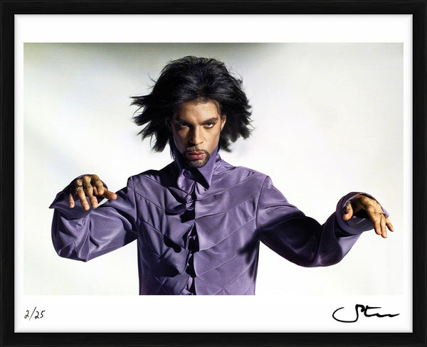 Prince posing in a purple shirt, 1999 — Limited Edition Print, framed - Steve Parke