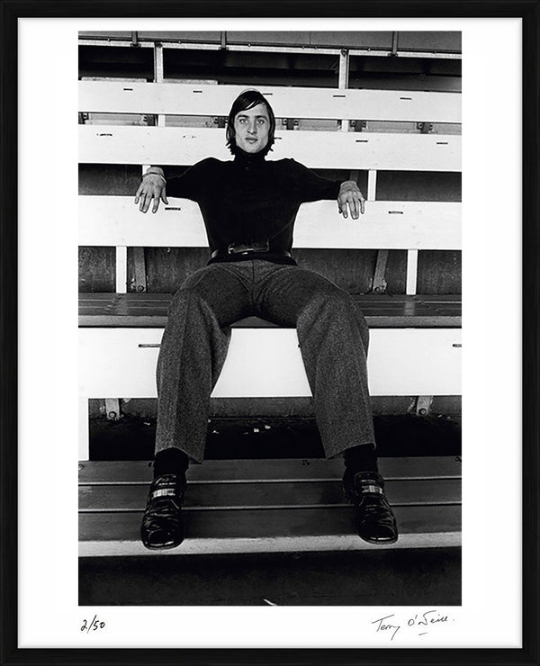 Johan Cruyff sitting in the stands, mid 1970s — Limited Edition Print, framed - Terry O'Neill