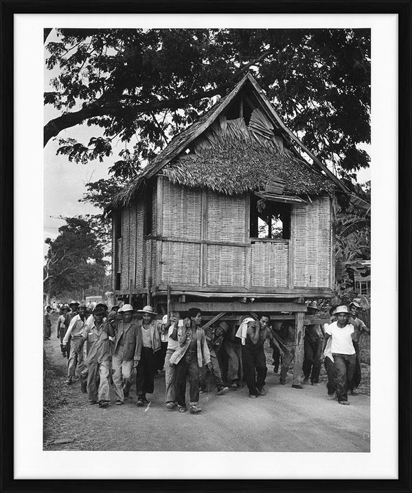 Bahay kubo house relocating, 1953 — Vintage Print, framed - George Rodger