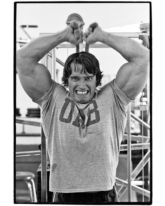 Arnold Schwarzenegger at Gold’s Gym, 1976 — Limited Edition Print - Al Satterwhite