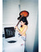 Amy Winehouse washing her guitar, 2003 — Limited Edition Print - Charles Moriarty