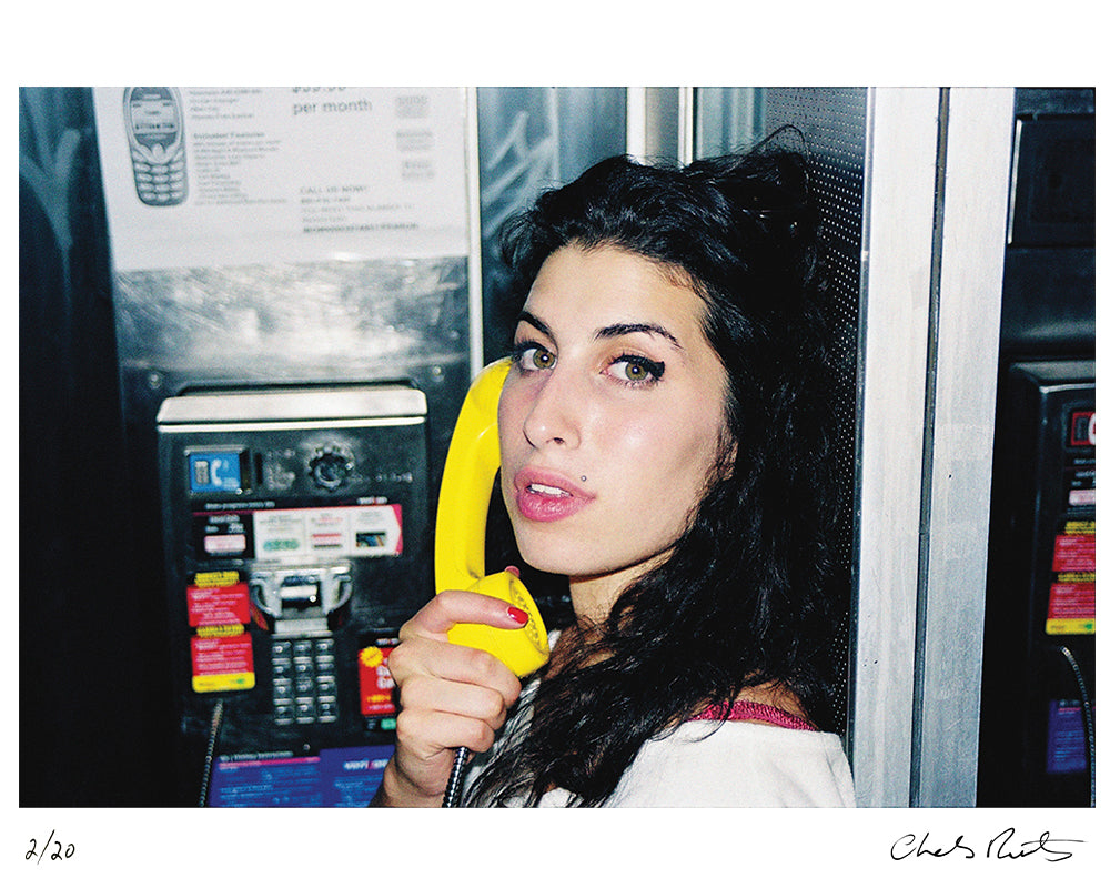 Amy Winehouse in a Phonebooth, 2003 by Charles Moriarty – Limited Edition Print.