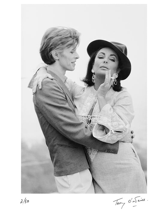 David Bowie & Elizabeth Taylor in Beverly Hills, 1975 — Limited Edition Print - Terry O'Neill