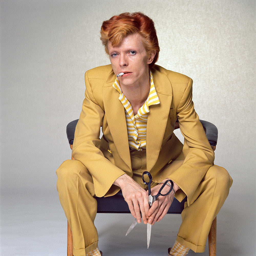 David Bowie in a mustard Burretti suit, 1974 — Limited Edition Print - Terry O'Neill