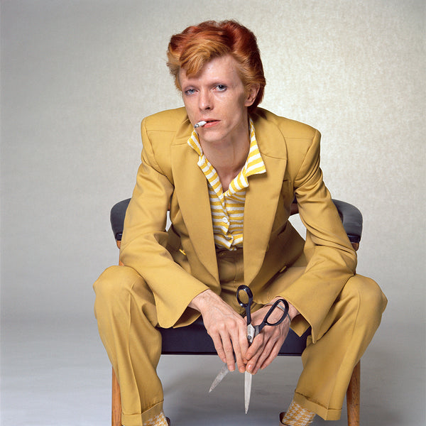 David Bowie in a mustard Burretti suit, 1974 — Limited Edition Print - Terry O'Neill