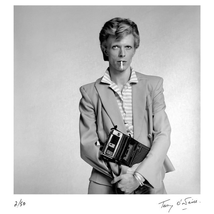 David Bowie holding a cassette player, 1974 — Limited Edition Print - Terry O'Neill