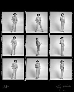 David Bowie holding a glass contact sheet, 1974 - Limited Edition Print by Terry O'Neill – Limited Edition Print.