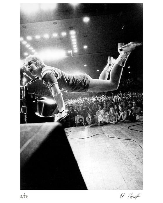 Elton John takes flight, 1970 — Limited Edition Print - Ed Caraeff