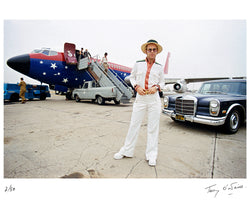Elton John with his private plane, 1974 — Limited Edition Print - Terry O'Neill