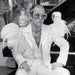 Elton John wearing a white feather suit, circa 1973 — Limited Edition Print - Terry O'Neill