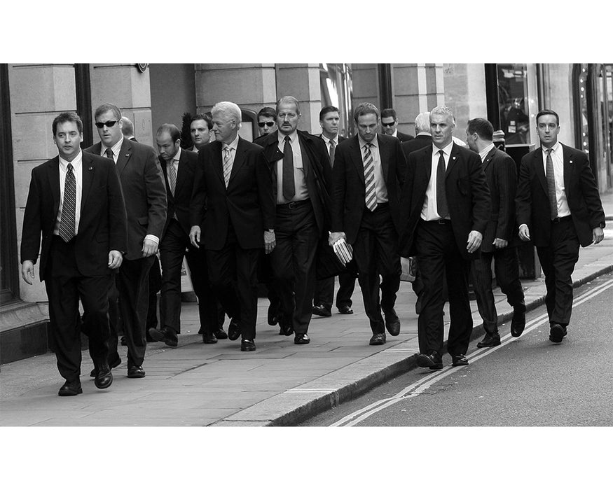 Bill Clinton walking on Jermyn Street, 2007 — Limited Edition Print - Greg Brennan