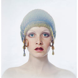 Twiggy wearing a beaded cap, circa 1971 - Limited Edition Print by Justin de Villeneuve – Limited Edition Print.