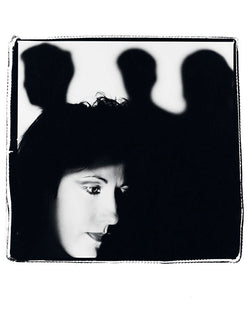 Gillian Gilbert with the band in shadow, 1985 - Limited Edition Print by Kevin Cummins – Limited Edition Print.