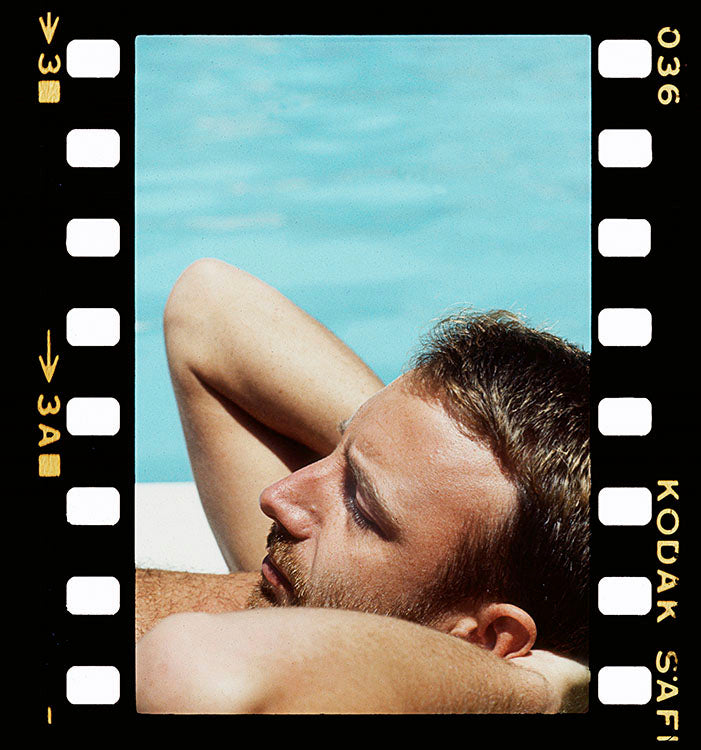 Peter Hook by the Pool, 1983 by Kevin Cummins – Limited Edition Print.