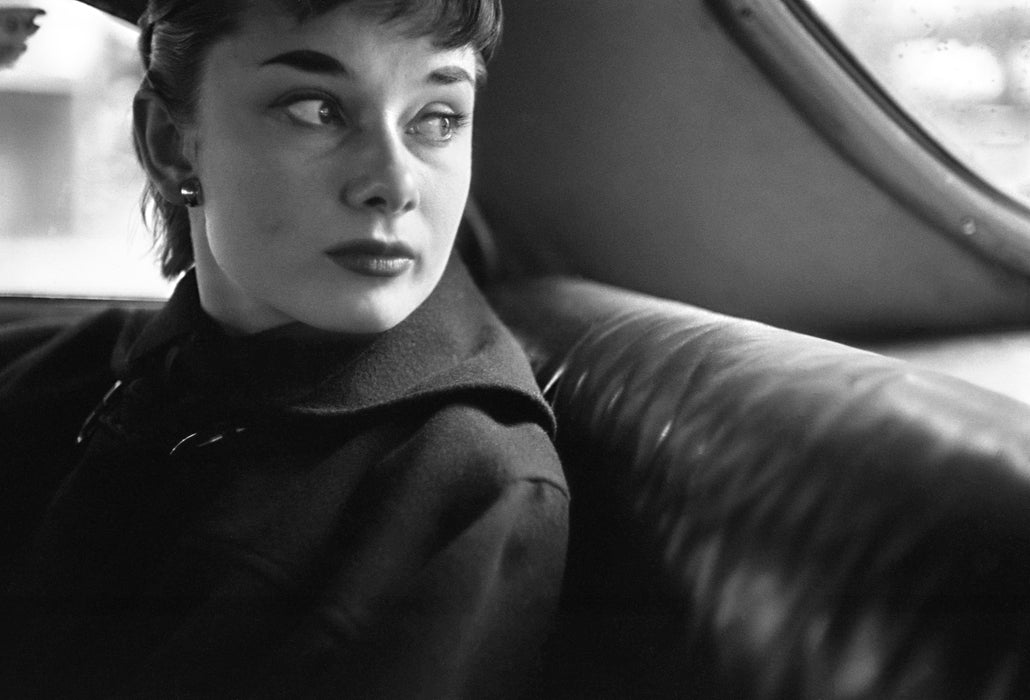 Audrey Hepburn inside a taxi, 1951 — Limited Edition Print - Lawrence Fried