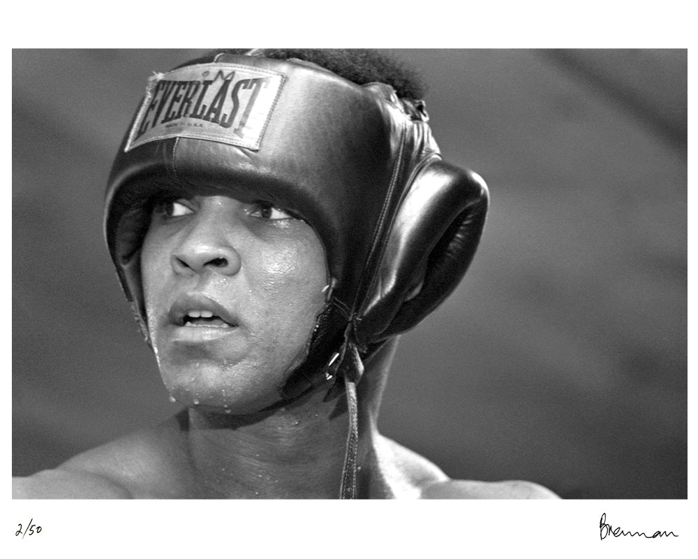 Muhammad Ali in an Everlast sparring helmet, 1977 by Michael Brennan – Limited Edition Print.